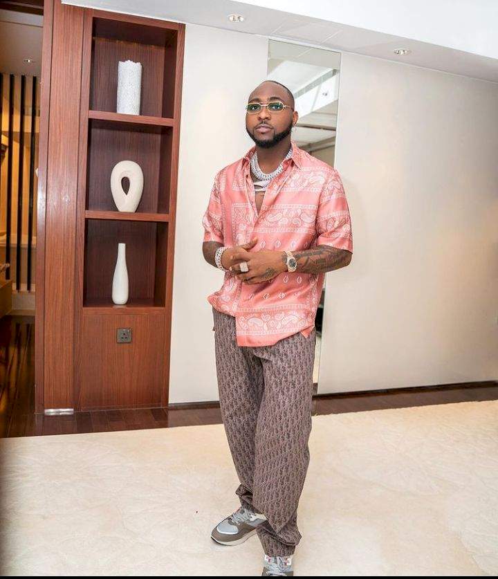 'You for collect wotowoto' - Reactions as troll who insulted Davido and his son tenders apology