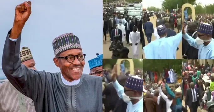 Daura residents file out to greet President Buhari as he treks to his home after observing his Sallah prayers at the Eid ground (video)