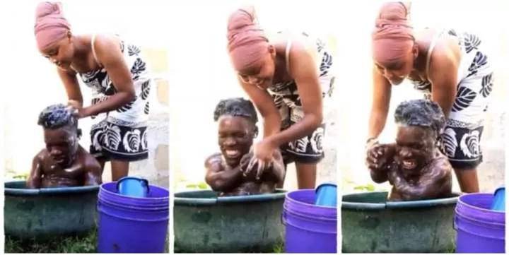 See reactions as lady puts small man inside plastic bowl, baths him like a baby