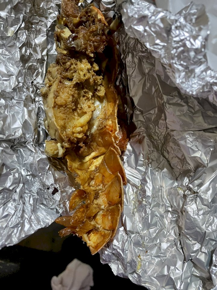 Lady in shock at what she received after paying N23k for a lobster at a Lagos restaurant