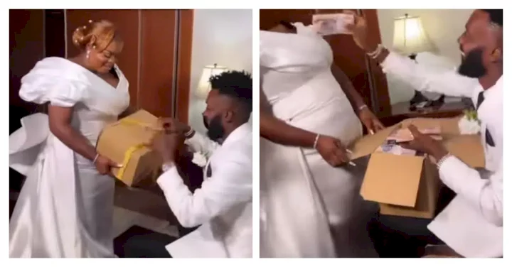 Bride raises the bar, presents hubby with box full of cash (Video)