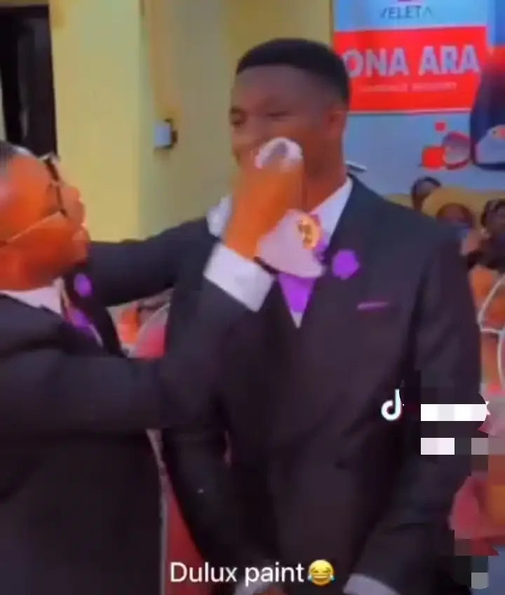 Groom trends as bride's make-up smears on his face during kiss on wedding day (Video)