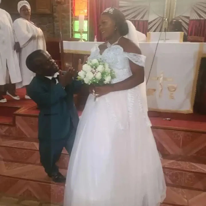 Diminutive teacher weds heartthrob