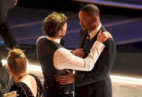 Denzel Washington, Tyler Perry, and Bradley Cooper comfort Will Smith after he slapped Chris Rock at the Oscars 