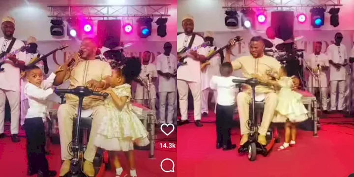Moment Yinka Ayefele's cute triplets joined him on stage as they struggle for microphone (Video)
