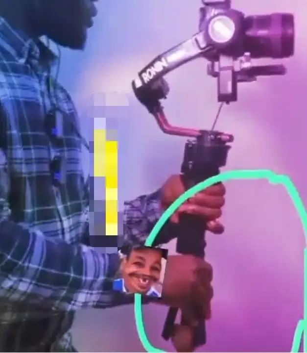 Moment cameraman is caught stylishly stealing while recording (Video)