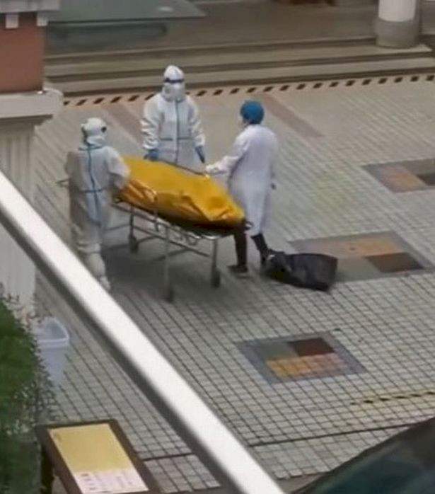 Covid patient in a body bag comes back to life just before being cremated after 'dying'