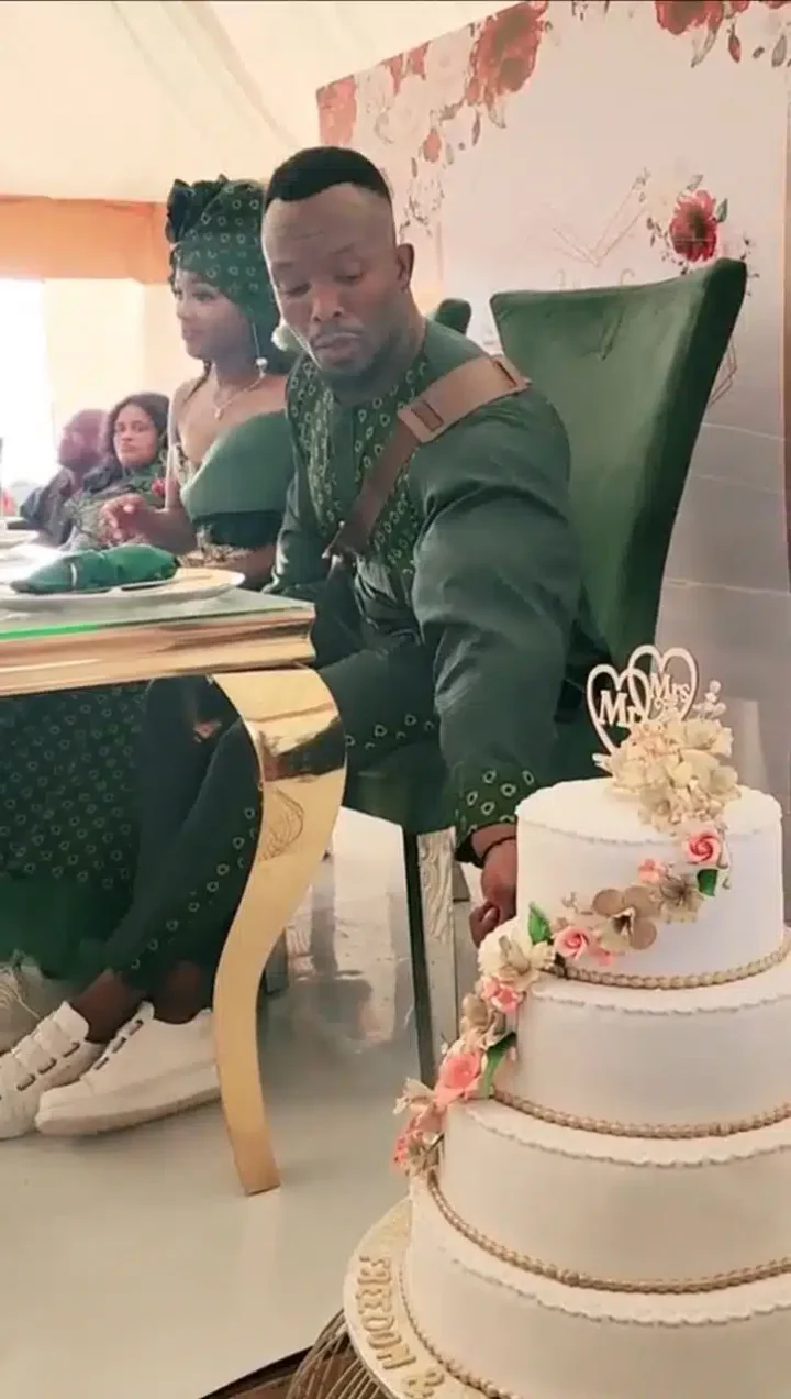 Moment groom couldn't hold back from eating cake at his own wedding (Video)