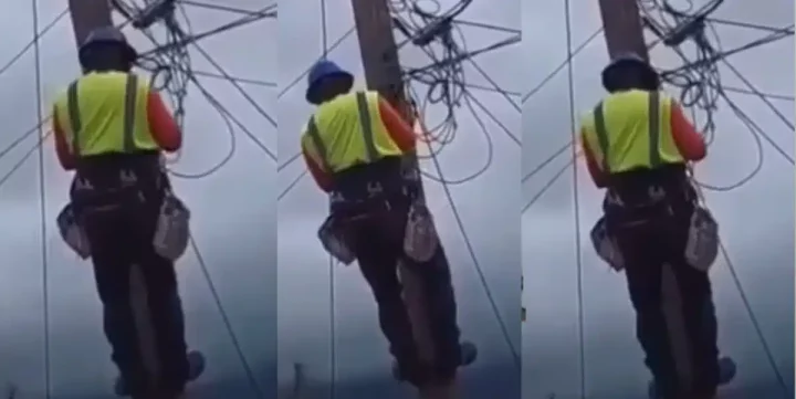 'Na your ex-girlfriend light dey send you go cut?' - Reaction as PHCN official dances on electric pole while disconnecting power (Video)