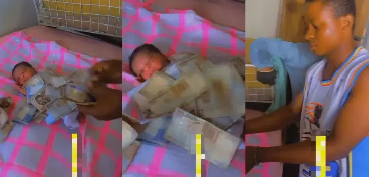Nigerian big boy who just became a father sprays money on his newborn baby (Video)