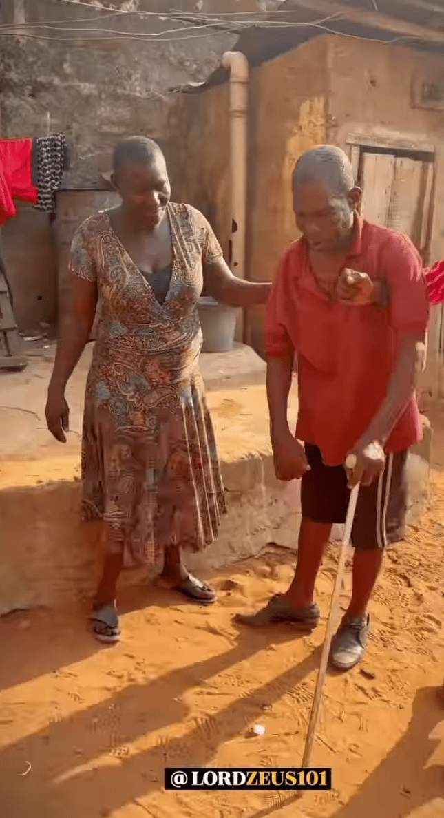 Nigerian woman collapses as skit maker surprises her with N2 million (Video)