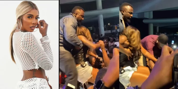 "This is so irritating" - Netizens rage as fan refused to let go of Tiwa Savage on stage