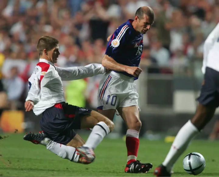 Steven Gerrard battles with Zinedine Zidane. Image: Getty