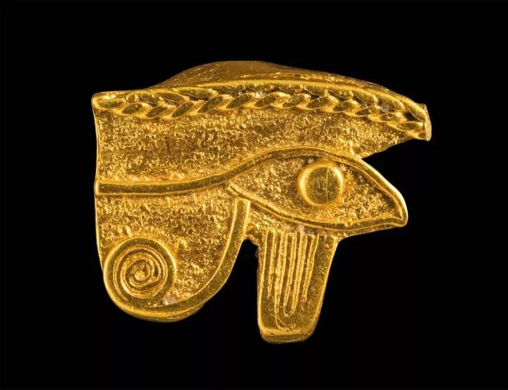 A gold amulet of the eye of the falcon god Horus