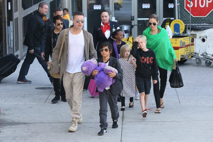 Brad with Pax and the rest of the family arriving at LAX in 2014