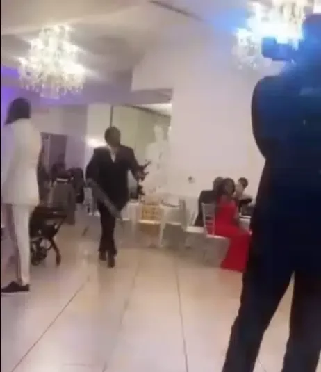 Moment man suddenly slumps as he arrives at his birthday party