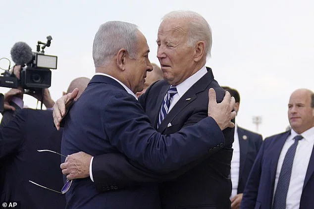 Netanyahu is 'prepared to g. o it alone without the US' and told Biden as much, Toth and Sweet claim. Pictured: The Israeli PM and US President meet in Tel Aviv on October 18