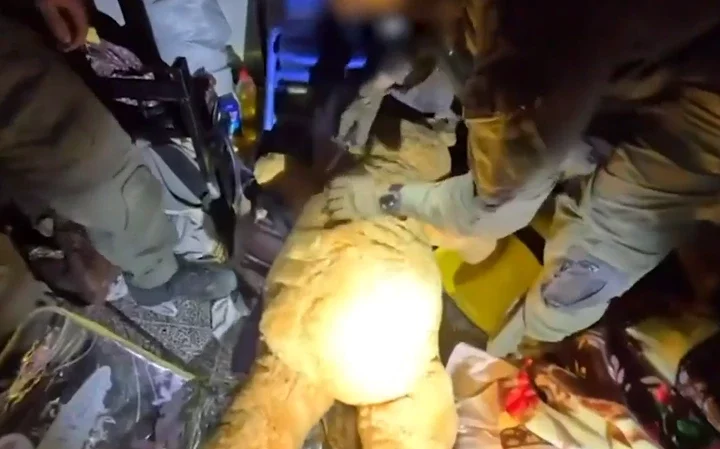 The large teddy bear was found inside a Gaza school