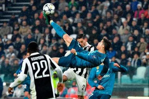 Cristiano Ronaldo scoring a overhead kick for Real Madrid against Juventus in 2018