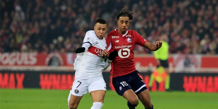 Man Utd transfer target Leny Yoro in Ligue 1 action for Lille.