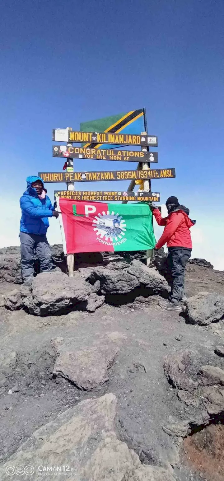 Labour Party supporter climbs to the top of Mount Kilimanjaro to hang the party's flag