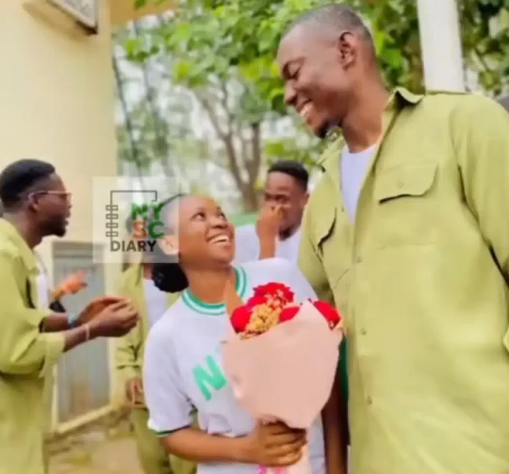 Youth corps member causes stir as he proposes to girlfriend at Abuja NYSC camp