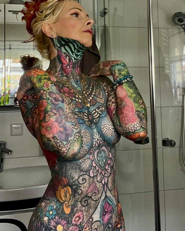 Grandma goes topless to flaunt her ?25k tattoo collection that covers her whole body (photos)