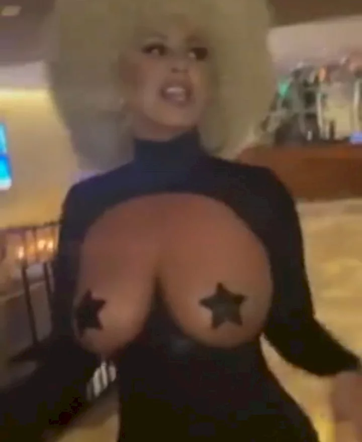 Amber Rose's b**bs hang out of her interesting Halloween costume