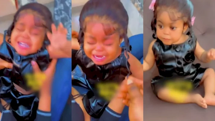 "Such an irresponsible mother" - Lady receives backlashes for fixing lace wig on her baby (Video)