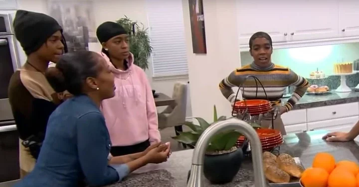 R. Kelly's ex-wife Andrea Kelly and his children Jay Kelly, Robert Kelly Jr., and Joann Kelly being interviewed