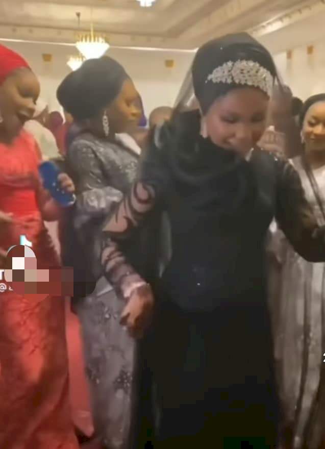 Groom spotted deep in thought as his bride scatters dance floor during wedding reception (Video)