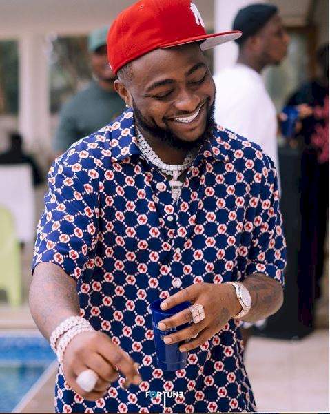 Crossdresser, James Brown calls out singer, Davido for blocking him on social media