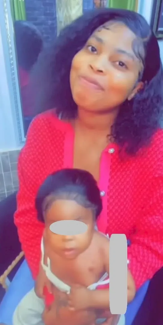 'When a child gives birth to a child' - Lady bashed for fixing wig on a year-old child (Video)