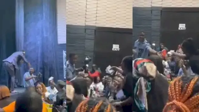 Attendees gift photographer stacks of cash after learning he worked as gateman for 8 years (Video) Attendees gift photographer stacks of cash after learning he worked as gateman for 8 years (Video)