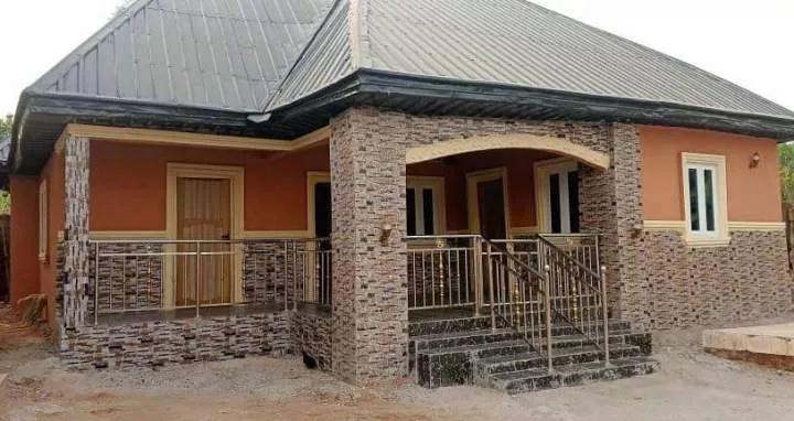 Nigerian lady demolishes her mother's old house; builds a beautiful new bungalow (photos)
