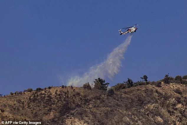 Firefighters in the stricken area have been overwhelmed by the rapidly spreading fires, amid scrutiny on the state's response