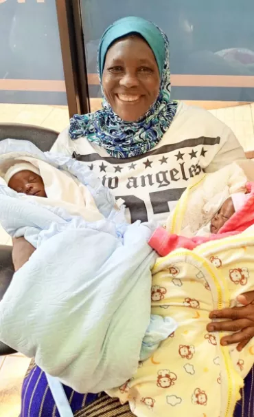 Ugandan woman who welcomed twins at 70 shares first photos of the babies after hospital discharge