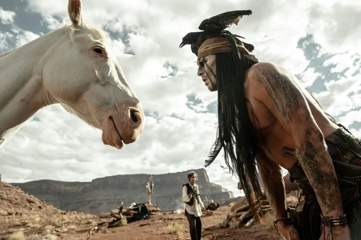 Johnny Depp with his horse in 'The Lone Ranger'