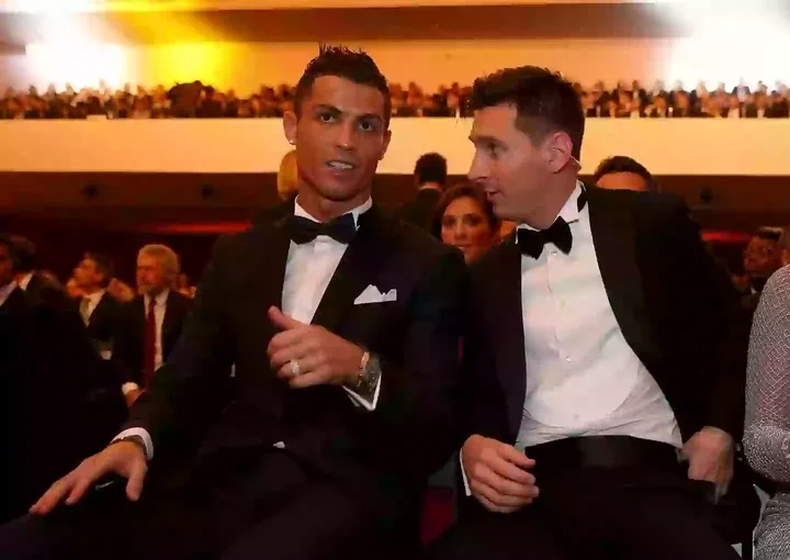 Ronaldo and Messi at an awards ceremony.