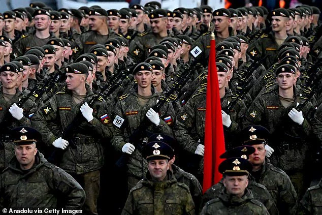 Security officials have warned that Britain would be 'outgunned' by Russia and its allies in a full-scale conflict. Pictured: Russian soldiers in Moscow on May 3