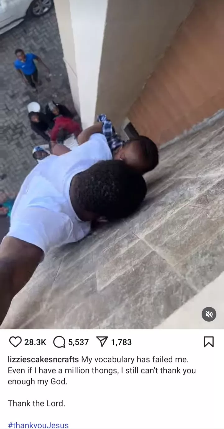 Man Heroically Holds On To Baby While Hanging Off Balcony As Fire Engulfs Building In Lagos (Video)