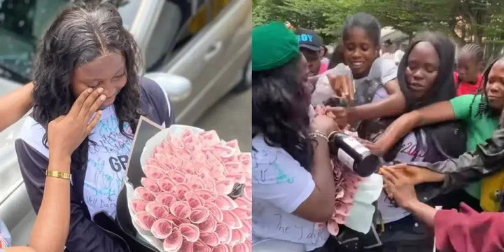 "You dey flaunt cash in front of hungry people" - Reactions as crowd steals money bouquet from new graduate