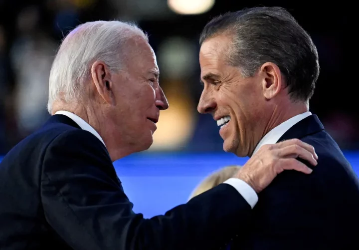 President Joe Biden and his son Hunter Biden embracing.