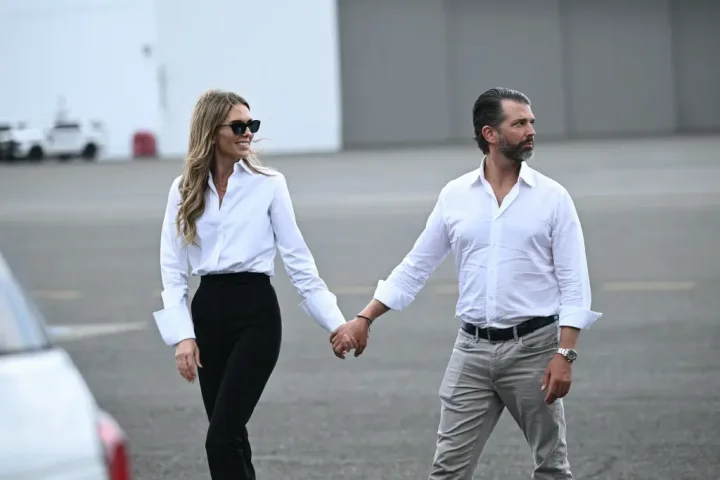 Donald Trump Jr. and girlfriend Bettina Anderson can?t keep their hands off each other