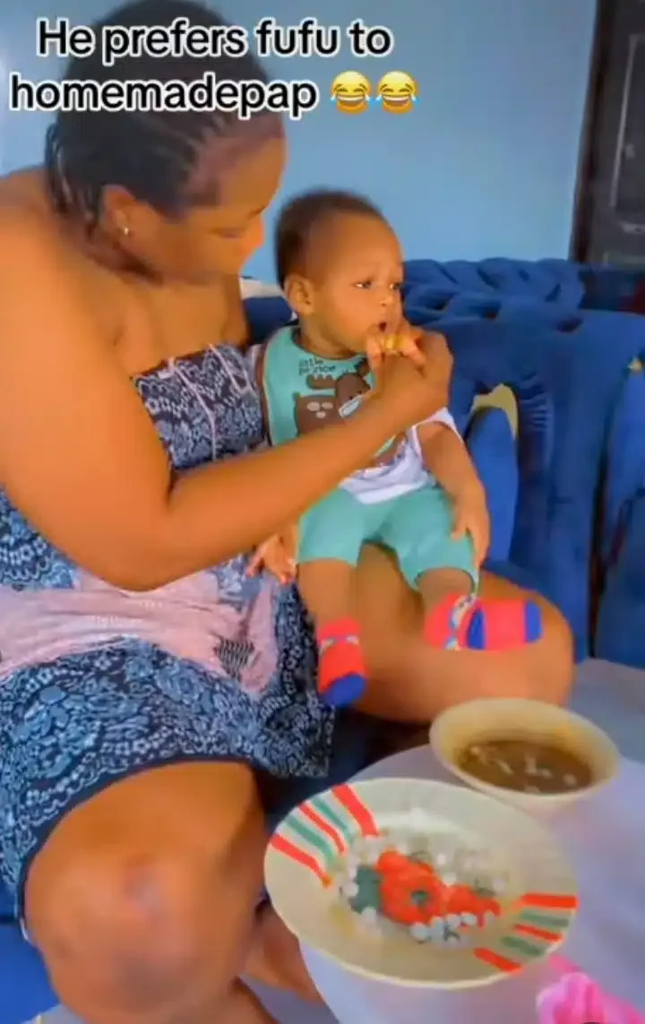 'Country situation no need light food' - Reactions as little baby rejects pap, eats Fufu