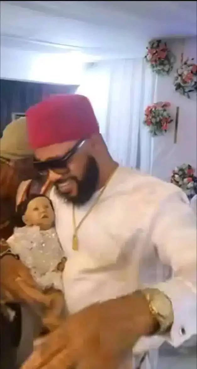 Couple reportedly uses doll baby to stand in for their daughter during celebration