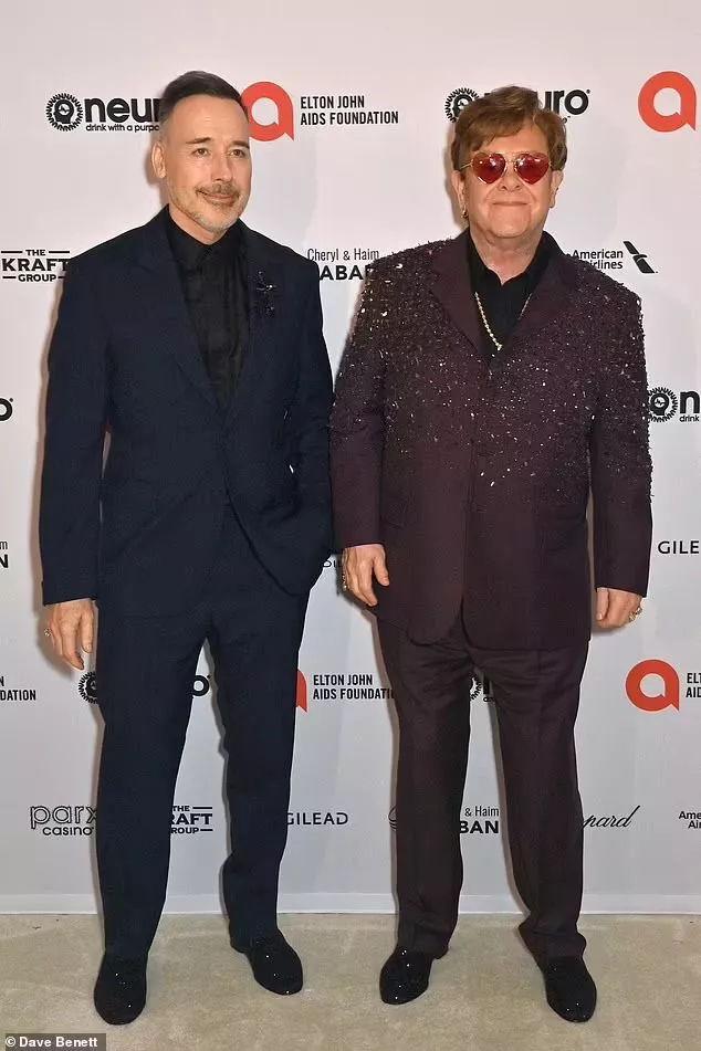 David Furnish and Elton John pictured together 2023