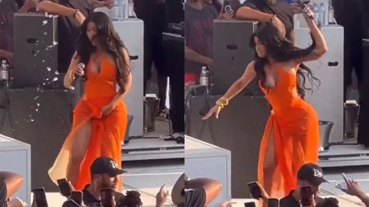 Rapper Cardi B now a suspect in battery case after she threw a microphone at a fan who hurled a drink at her on stage