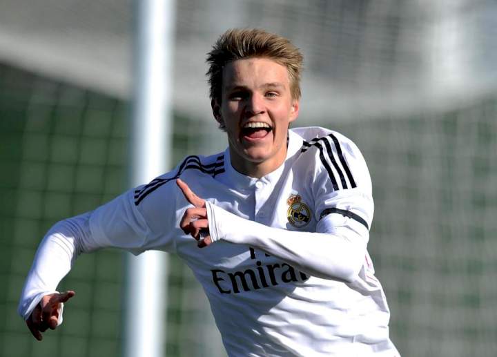 Martin Odegaard completes £34m switch from Real Madrid to Arsenal as Norway ace signs five-year deal at Emirates - but LaLiga club have first refusal if club sell him