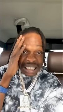 Dispatch rider almost crushed by truck while collecting money from Naira Marley (Video)